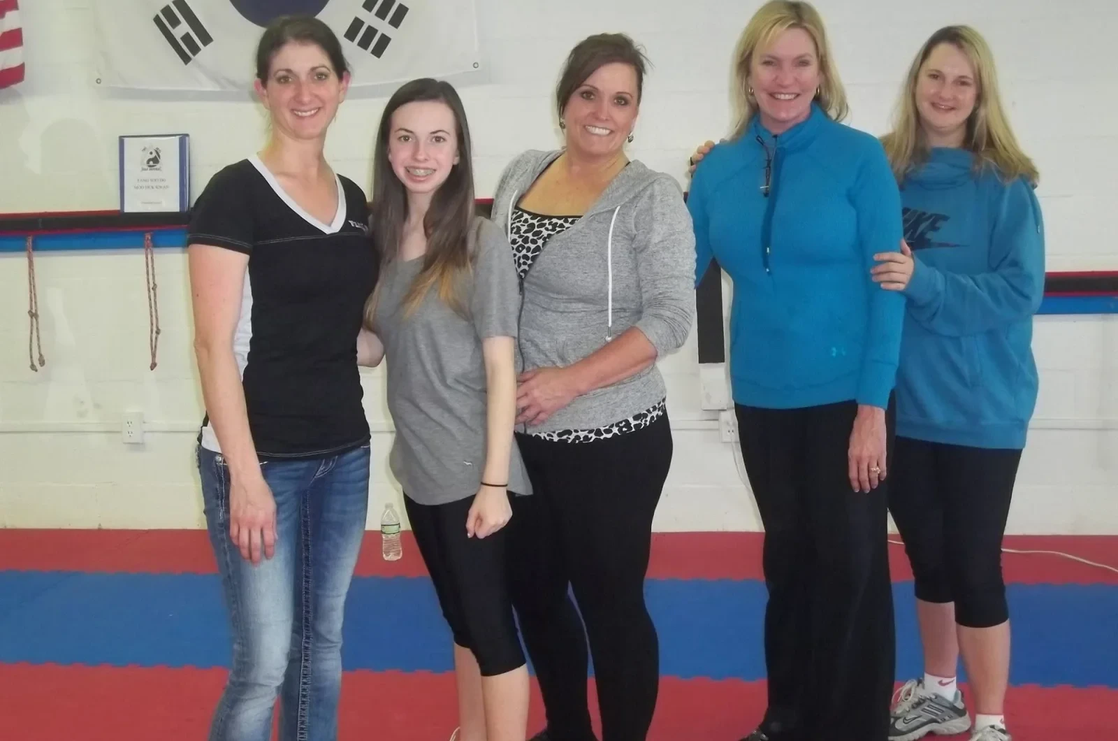 Adults relieving stress through martial arts